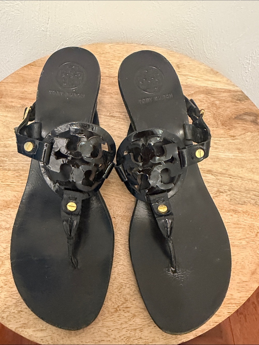 Tory Burch Black Leather Logo Thong Sandals with Gold Accents